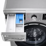 LG F4R5VYG2P washing machine detergent drawer and wash programme control dial close-up