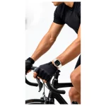 Green Lion Time Smart Watch in silver worn by cyclist, showing rectangular display and light silicone strap during cycling