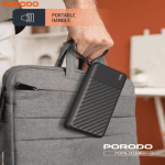 Porodo PDPBJ33 power bank with portable handle being carried in bag.
