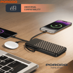 Porodo PDPBJ33 power bank charging multiple devices on desk setup.
