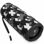 JBL Flip 6 Martin Garrix Edition Bluetooth speaker showing controls, wrist strap and geometric pattern