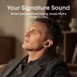 Man wearing Soundcore Liberty 5 Pro earbud during personalized sound demonstration