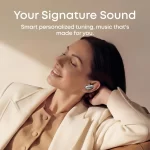 Woman wearing Soundcore Liberty 5 Pro white earbud during personalized sound demonstration